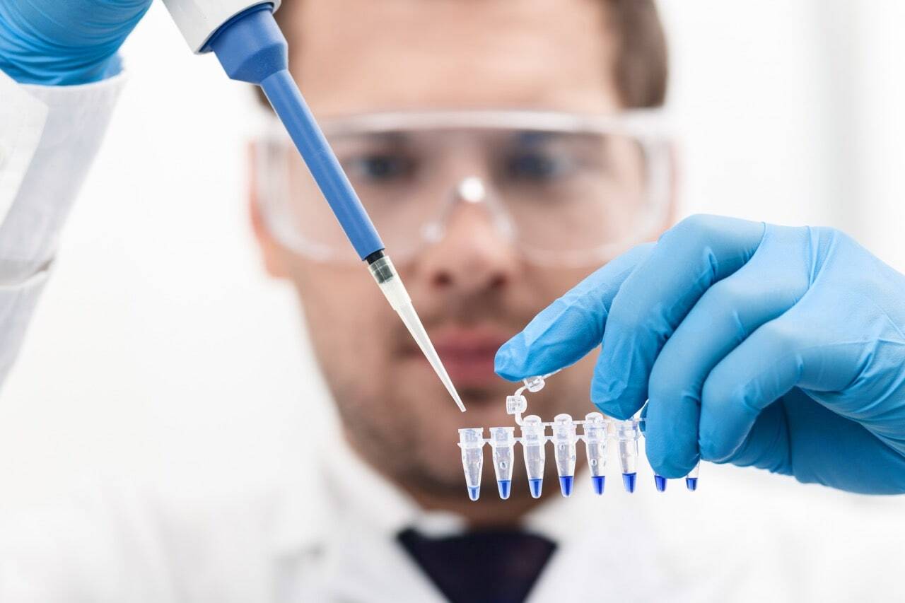 male-researcher-working-with-samples_110111871